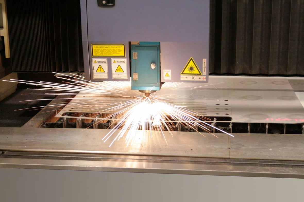 Precision metal fabrication machine doing defense manufacturing project for nuclear aircraft carrier at Fox Valley Metal Tech